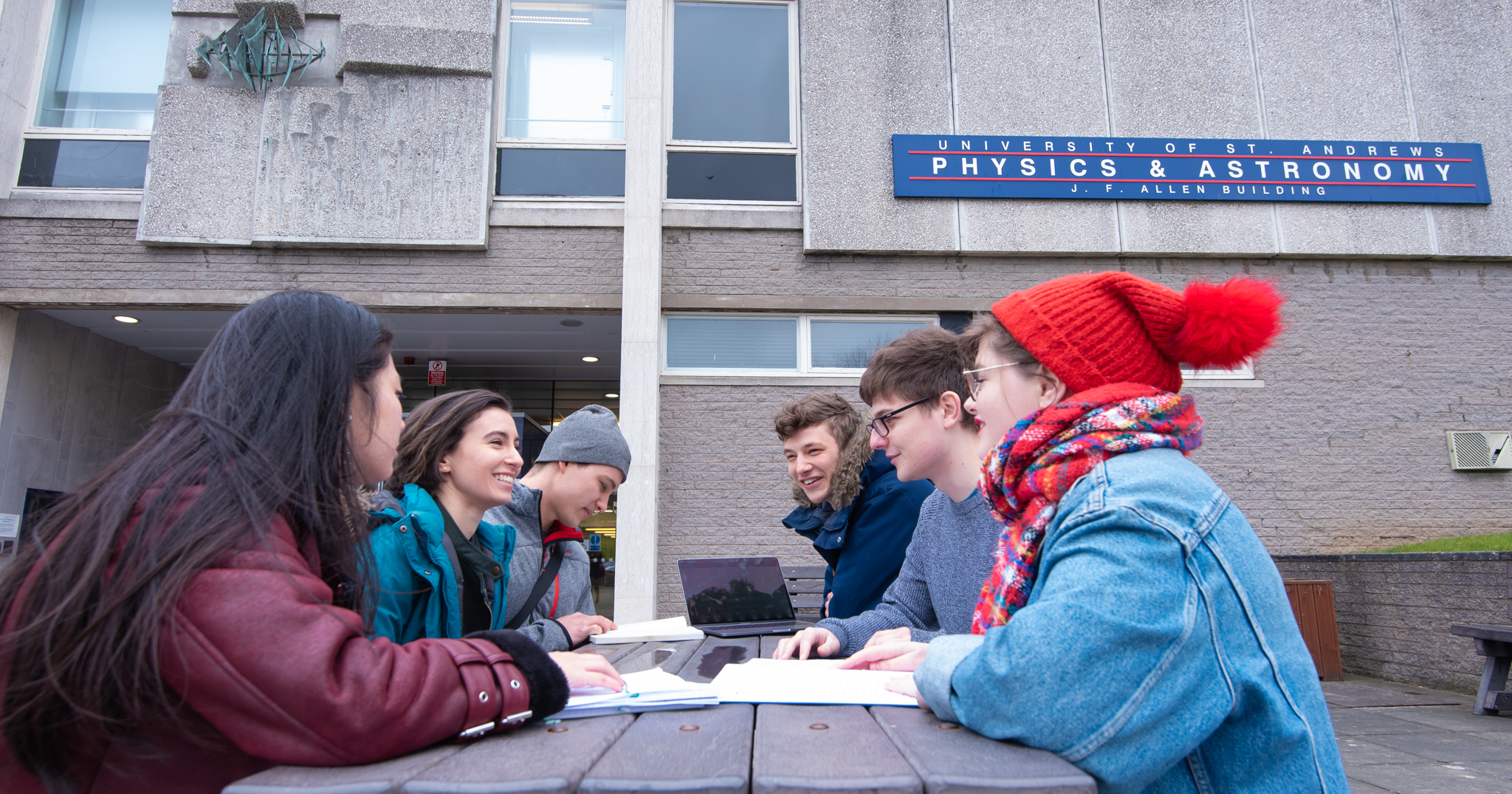 A group of students outside the JF Allen building